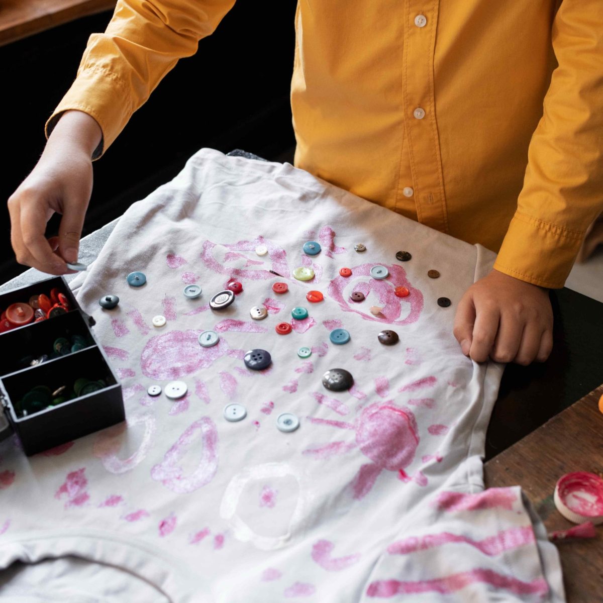 young-child-making-diy-craft-project-with-t-shirt